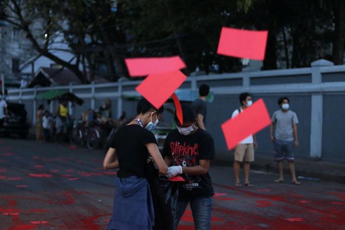 Photos: : AFP - ဧပြီလ (၁၀)ရက် ရန်ကုန်မြို့တွင် ကျောင်းသားသမဂ္ဂများစုပေါင်း၍ စစ်အာဏာရှင်ဆန့်ကျင်ရေး “Red Movement Activity” လှုပ်ရှားမှု မြင်ကွင်း