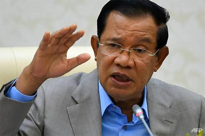 Staunch Beijing ally Hun Sen has been criticised for insisting Cambodians should stay put in locked-down Wuhan city. (Photo: AFP/TANG CHHIN Sothy)