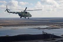 ယူကရိန်း  Mi-8 ရဟတ်ယာဉ် တစ်စင်းအား နိုင်ငံအရှေ့ပိုင်း ဒွန်နက်စ်ဒေသတွင် တွေ့ရစဉ်။  Photo - Aljazeera