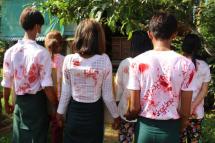 (Photo: :AFP - ဧပြီလ ၂၈ရက်၊ ထားဝယ်မြို့ လောင်းလုံမြို့နယ်ရှိ လူငယ်များ၏ အကြမ်းဖက်စစ်ကောင်စီအားဆန့်ကျင်ကြောင်း သွေးမတိတ်‌တဲ့ဆေးသပိတ်ဖြင့် ဆန္ဒပြလှုပ်ရှားမှုမြင်ကွင်း)