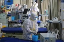 Medical workers prepare the ICU ward for admitting critical patients not related to the coronavirus outbreak, in Wuhan Union Hospital, on March 12, 2020.PHOTO: EPA-EFE