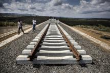   Incomplete rail tracks for the Standard Gauge Railway (SGR) line lay on the ground near Duka Moja, Kenya. Photographer: Luis Tato/Bloomberg 